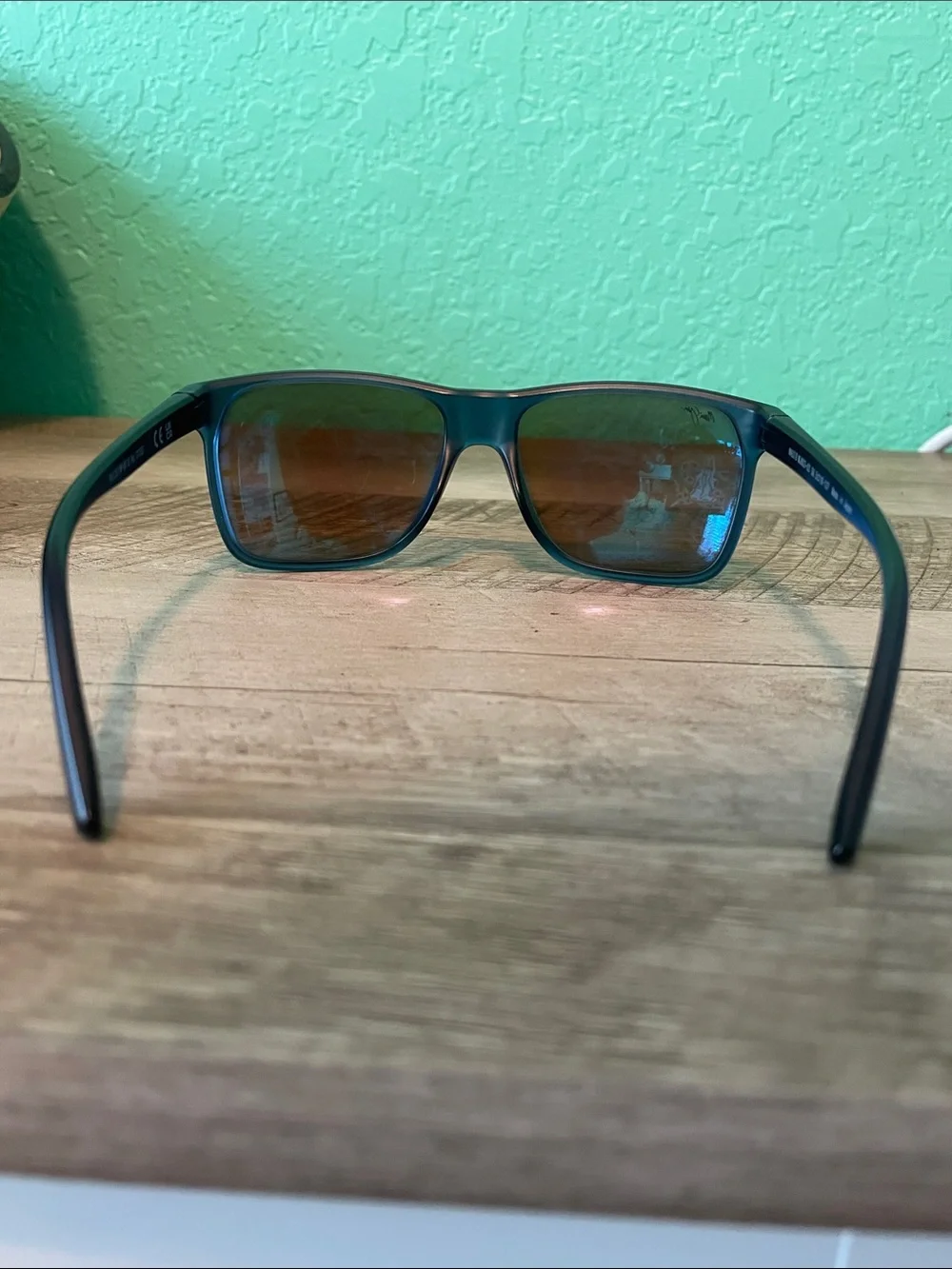 Maui Jim Black Frame Sunglasses with Blue Purple Mirrored Lenses